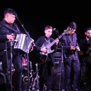 Musicians getting ready for stage performance