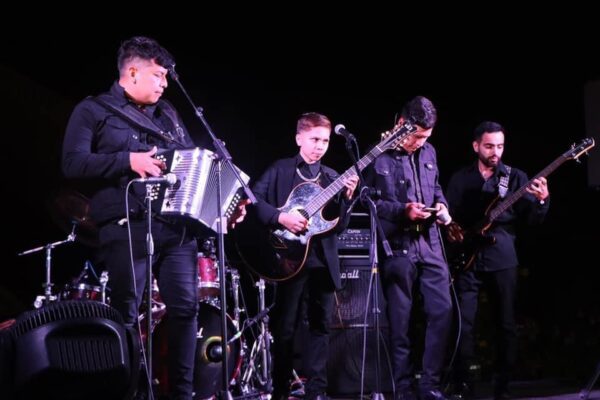 Musicians getting ready for stage performance