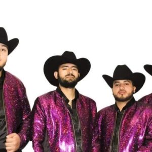 Musicians in glittering pink jackets and cow boy hats