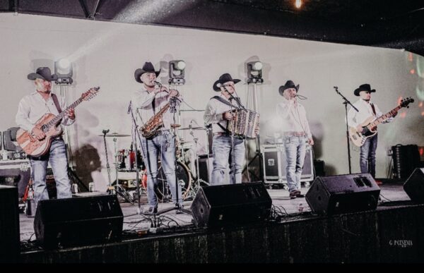 An old picture of musicians performing on stage