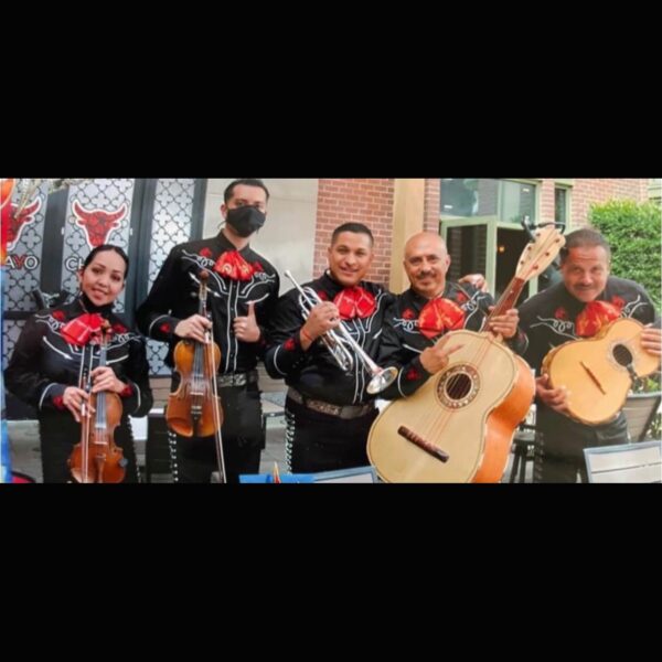 Mariachis LV band with red color bow on their neck