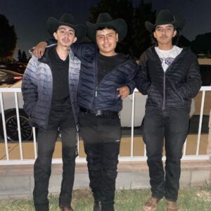 Musicians with cow boy hat and jackets posing