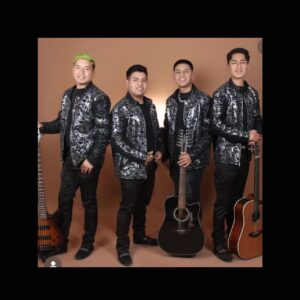 music band all dressed up in black and posing with their guitars