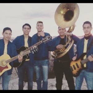 Music band posing for a picture with their musical instruments