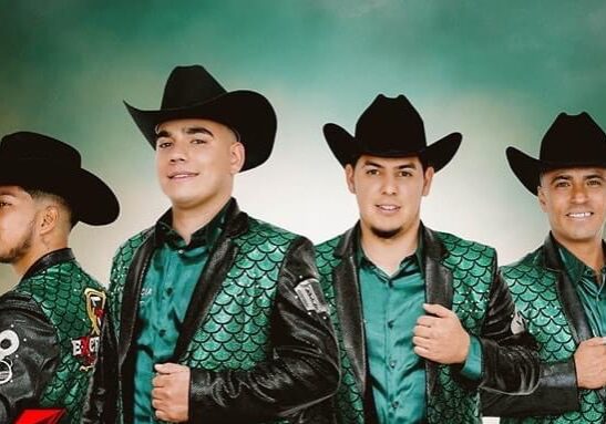 GN MEX TJ band posing in green color jackets
