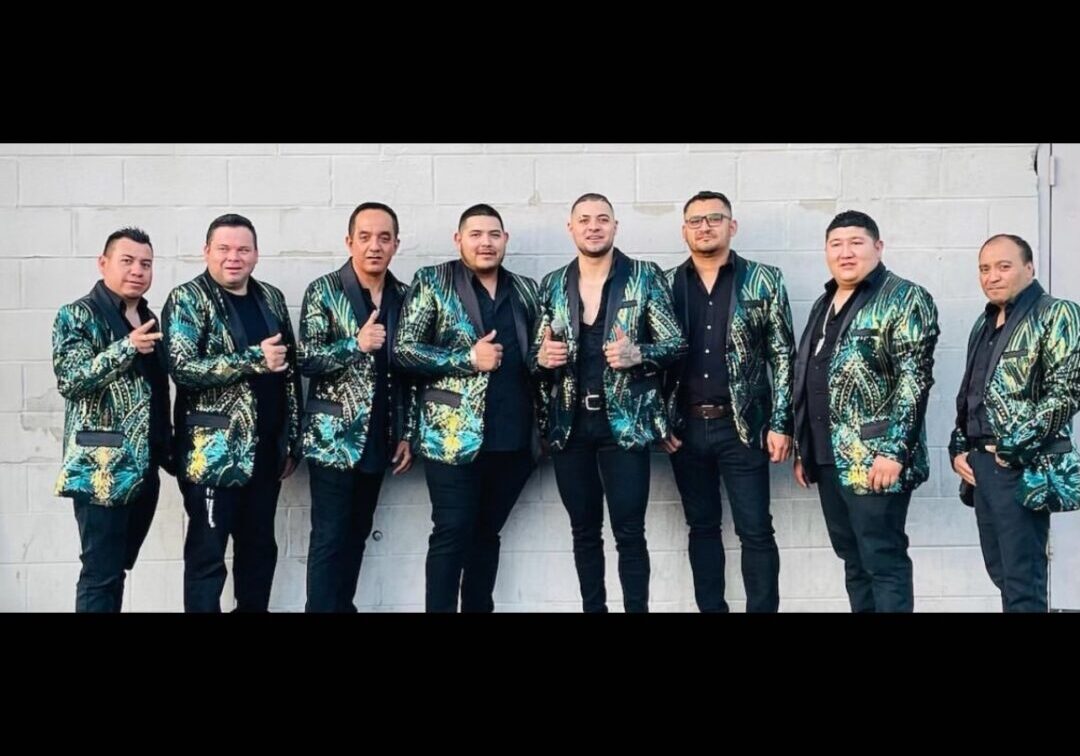Musician band dressed up in sparking jackets
