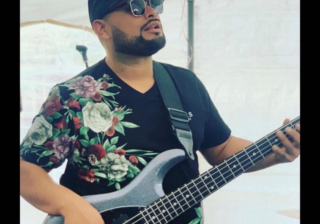 Musician playing stingray Guitar